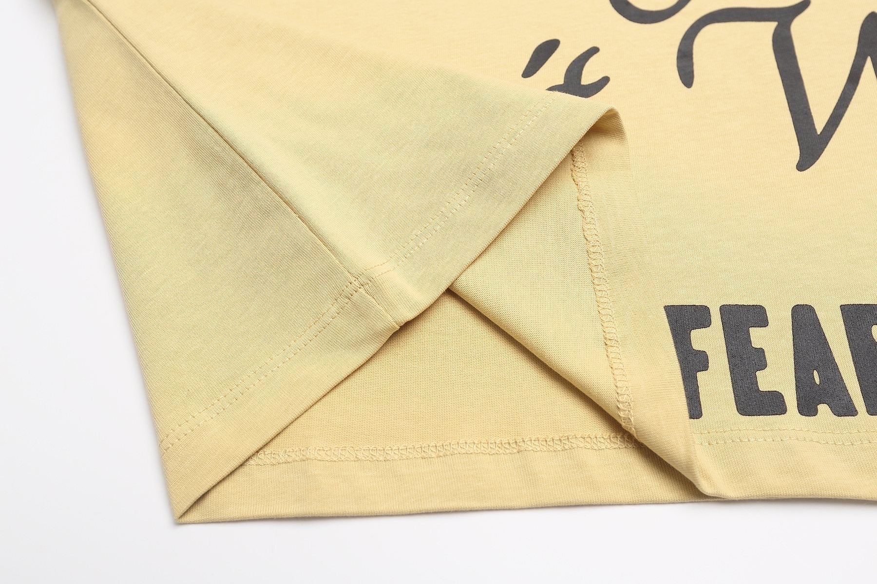 FEAR OF GOD Don’t Buy Where You Can’t Work Short-Sleeve T-Shirt — detail
