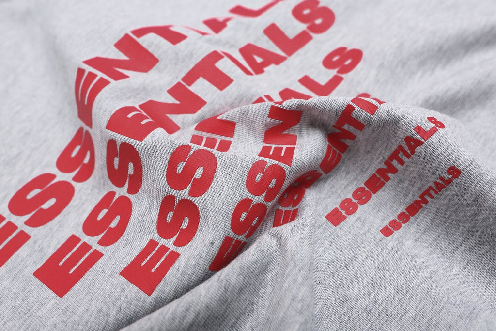 ESSENTIALS Repeated Graphic Short-Sleeve T-Shirt — detail