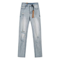 Ksubi Distressed Light Wash Slim Tapered Jeans — hero