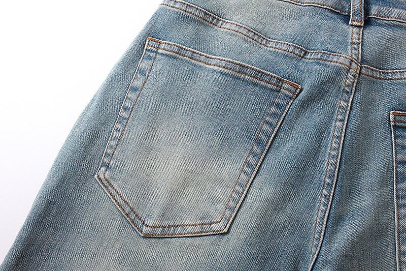 LOSTSHDWS Light Blue Daisy Applique Flared Jeans — detail