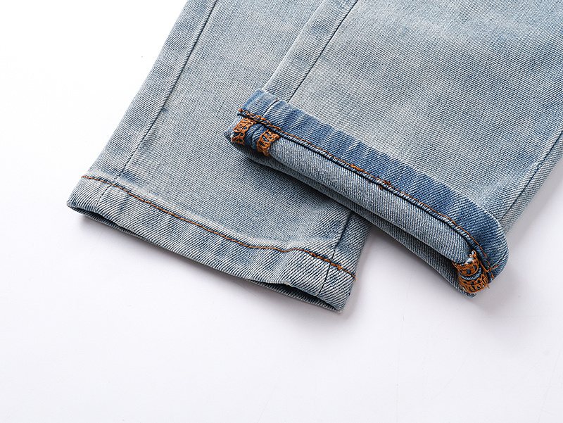 AMIRI Light Blue Patch Detail Slim Tapered Jeans — detail