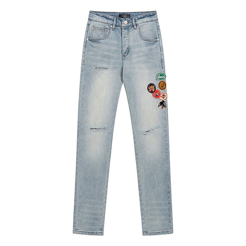 AMIRI Light Blue Patch Detail Slim Tapered Jeans — front