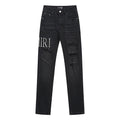 AMIRI Distressed Slim Tapered Jeans — hero