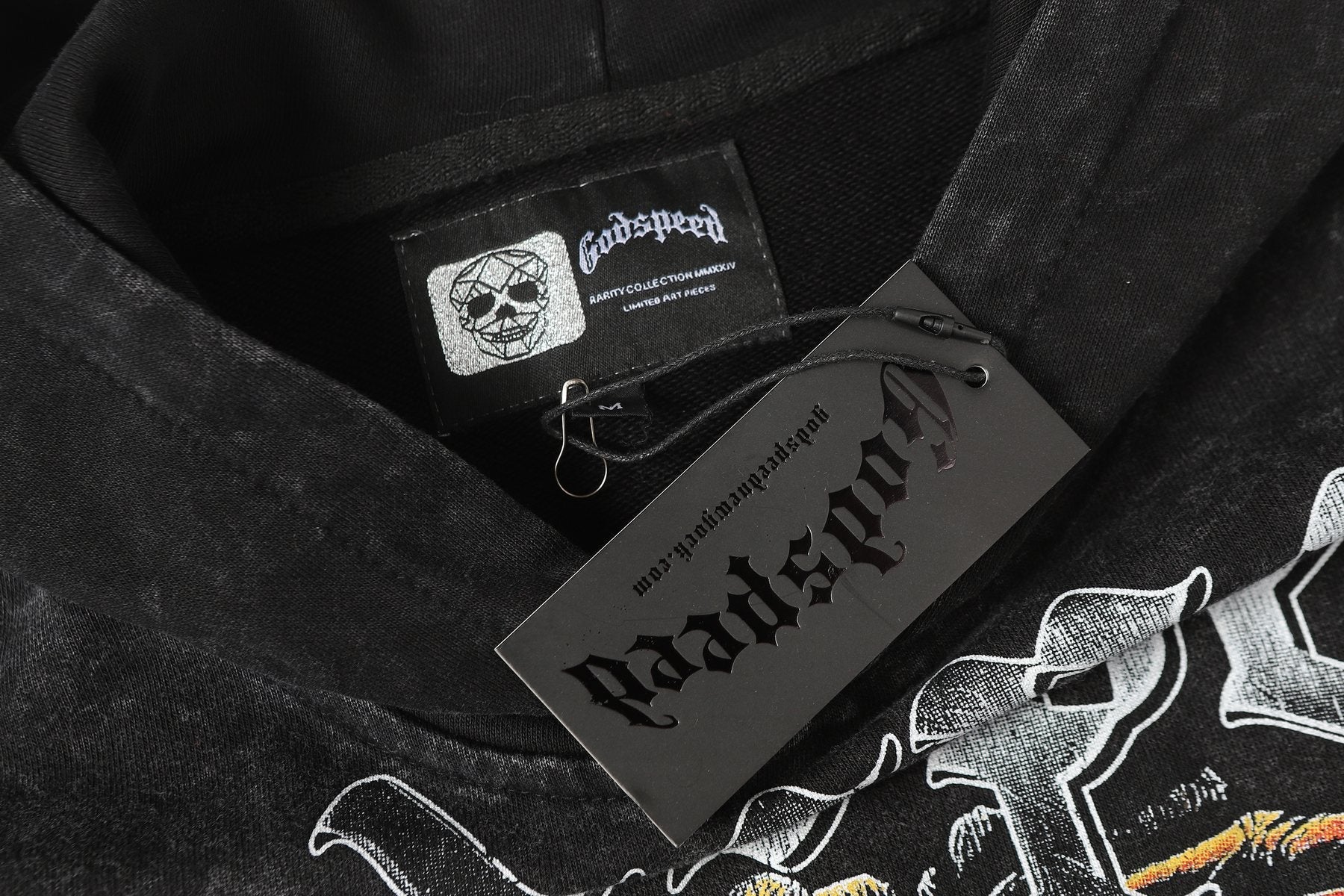 Godspeed Skull Graphic Acid Wash Hoodie — hang_tag