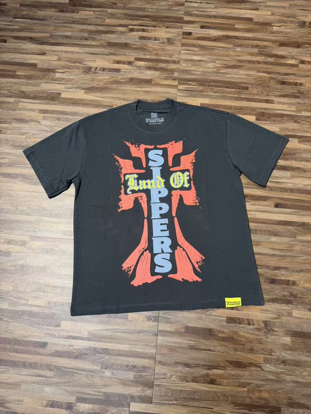 THAT'S A AWFUL LOT OF COUGH SYRUP Cross Graphic Short-Sleeve T-Shirt — front