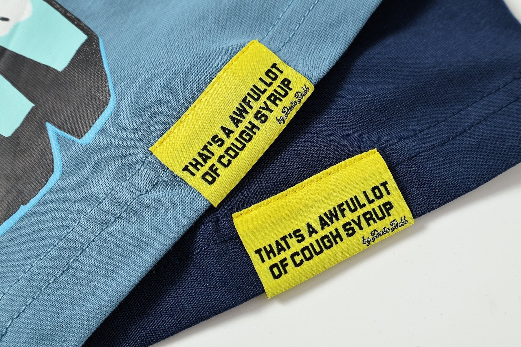 THAT'S A AWFUL LOT OF COUGH SYRUP Juiceman Graphic T-Shirt — fabric_closeup