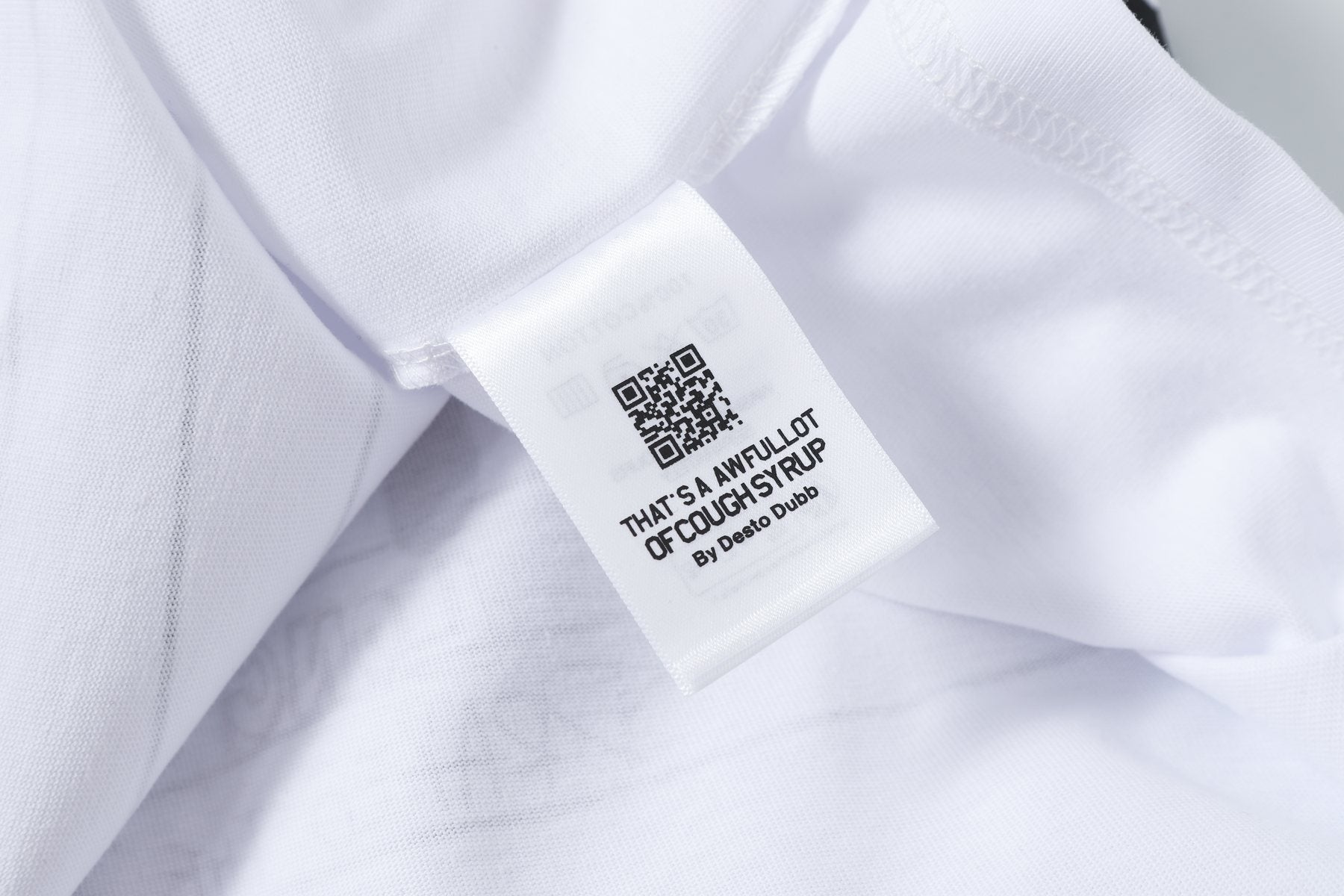 THAT'S A AWFUL LOT OF COUGH SYRUP Front & Back Graphic T-Shirt — neck_label