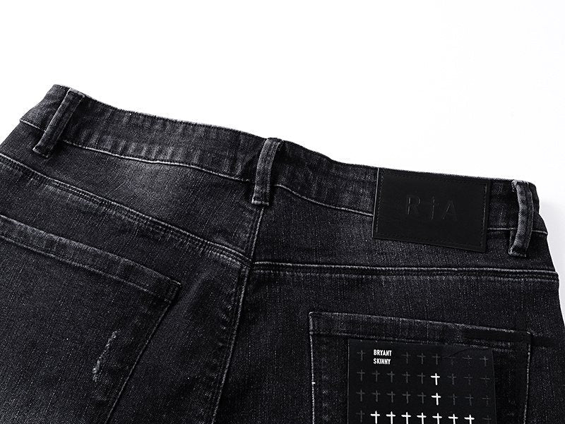 RTA Black Cross-Stud Washed Denim Jeans — detail