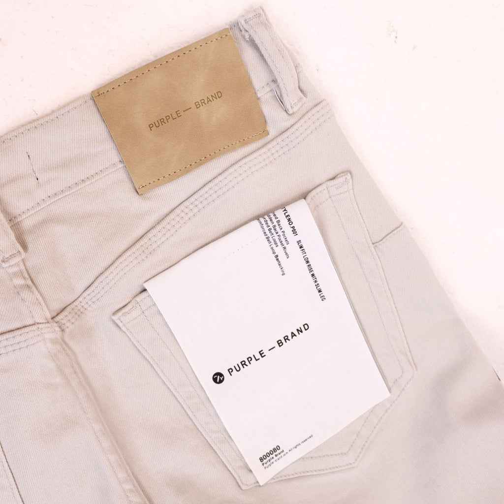 Purple Brand Distressed Graphic Jeans — hang_tag