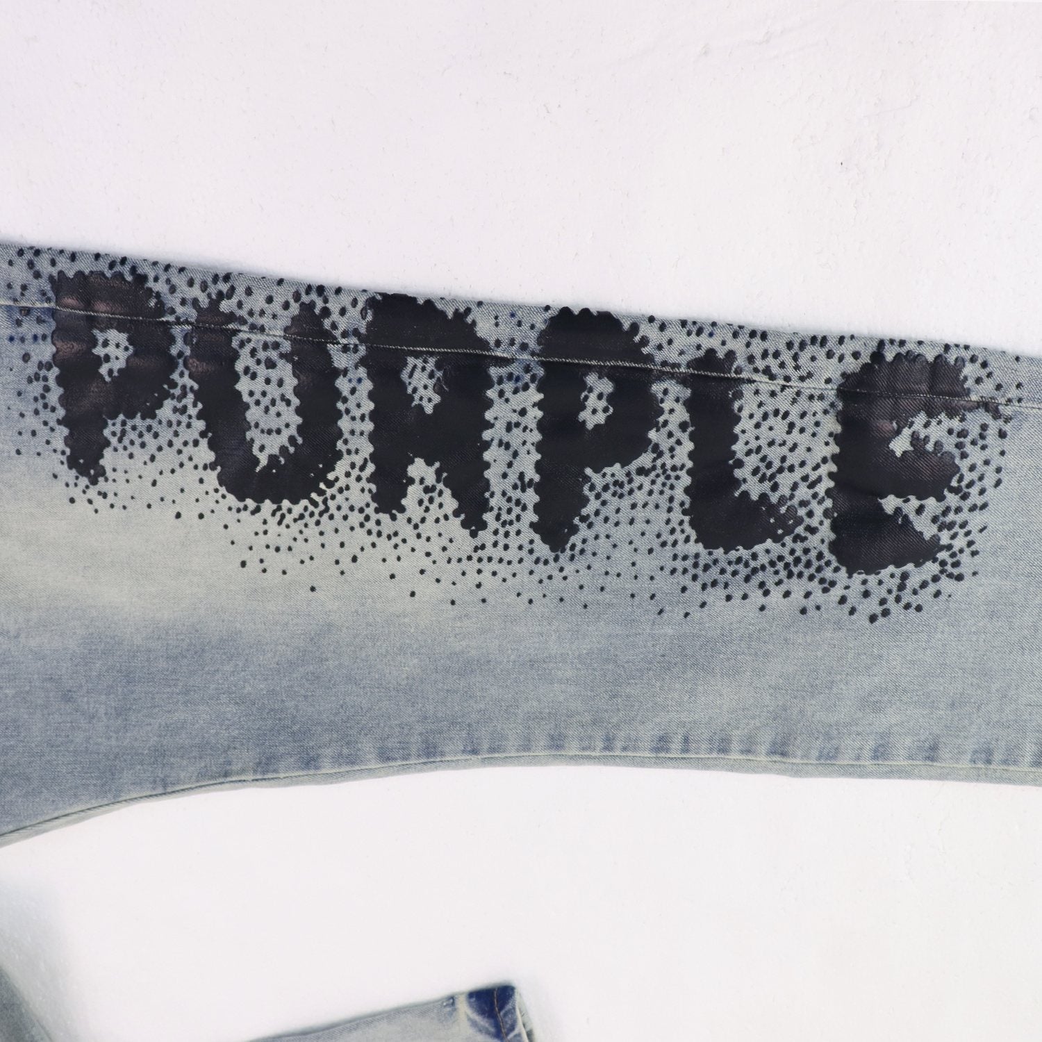 Purple Brand Light Blue Washed Graphic Jeans — detail