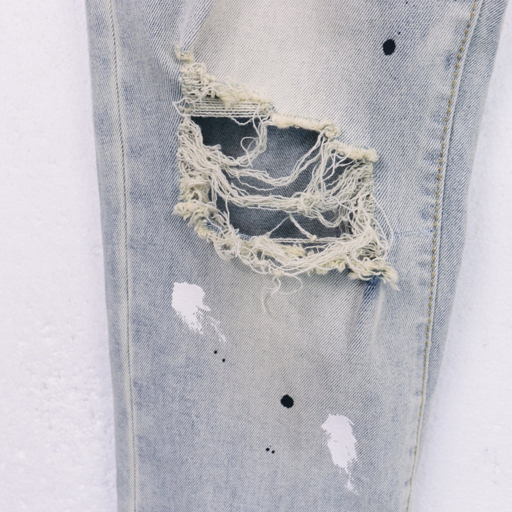 Purple Brand Light Blue Distressed Paint Splatter Jeans — detail