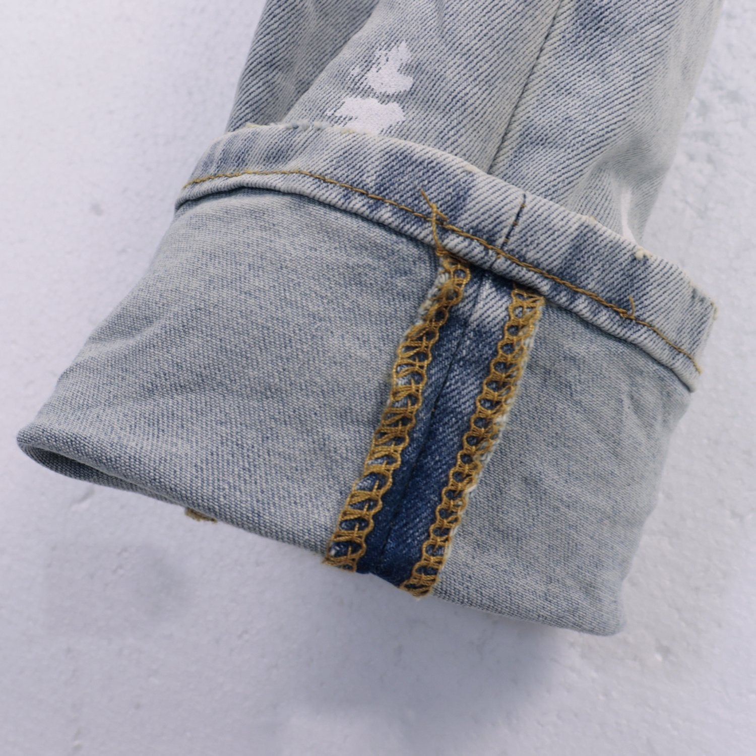 Purple Brand Light Blue Distressed Paint Splatter Jeans — detail