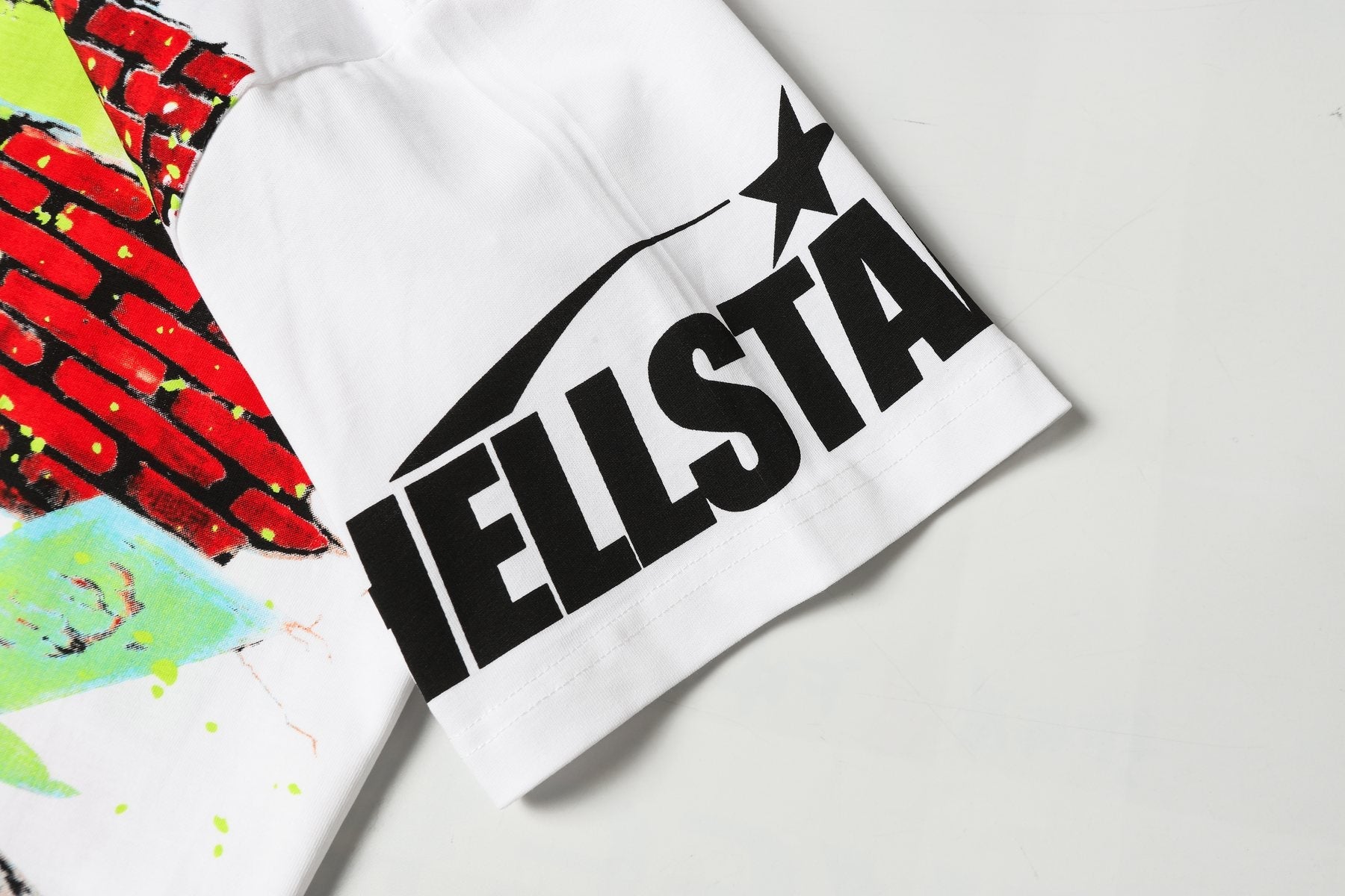 Hellstar Brick Wall Open 24/7 Graphic T-Shirt — detail