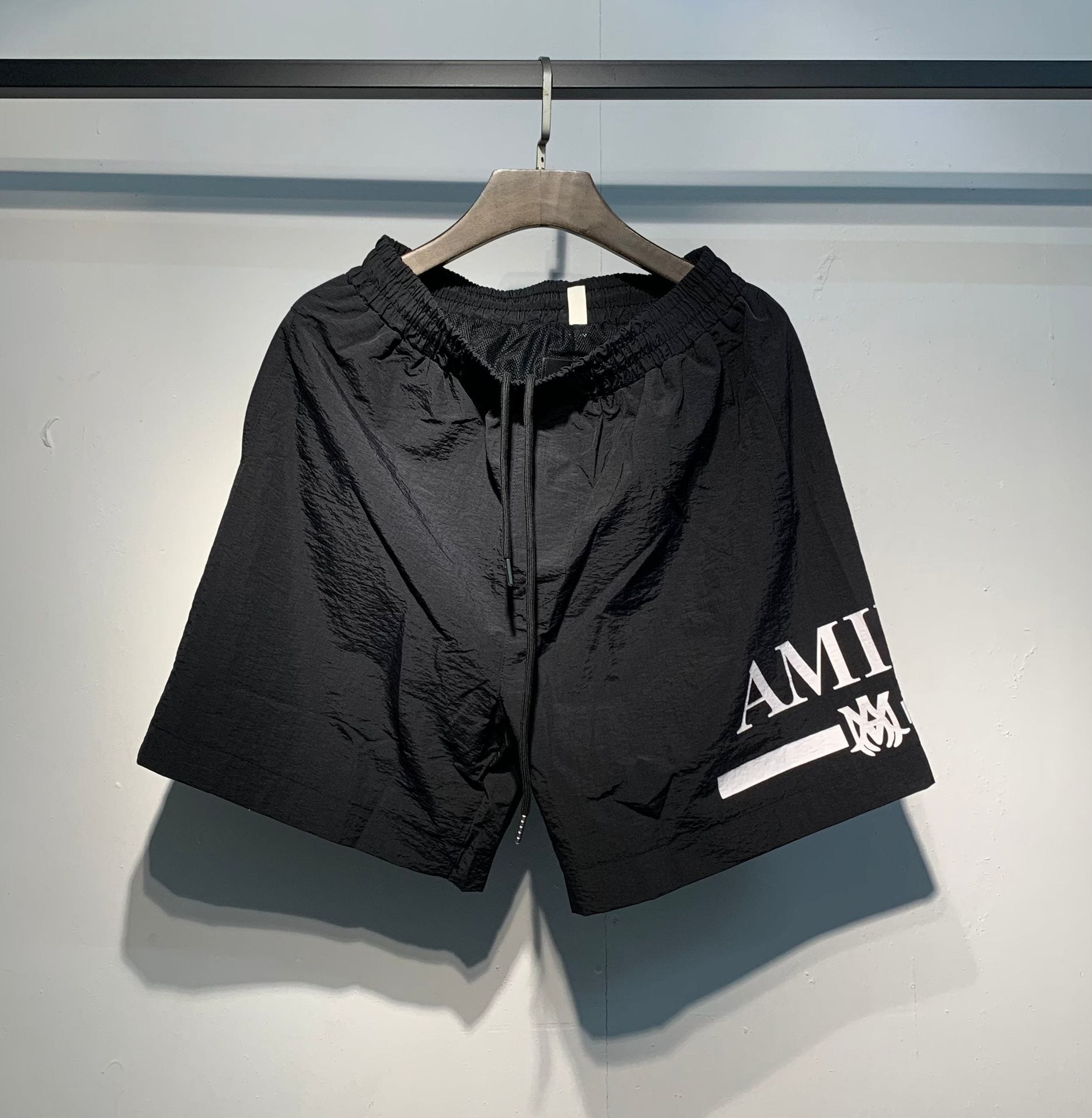 AMIRI Logo Graphic Shorts — hero