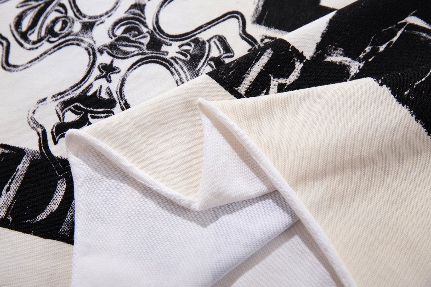MAJESTIK Distressed Rhinestone Graphic T-Shirt — fabric_closeup