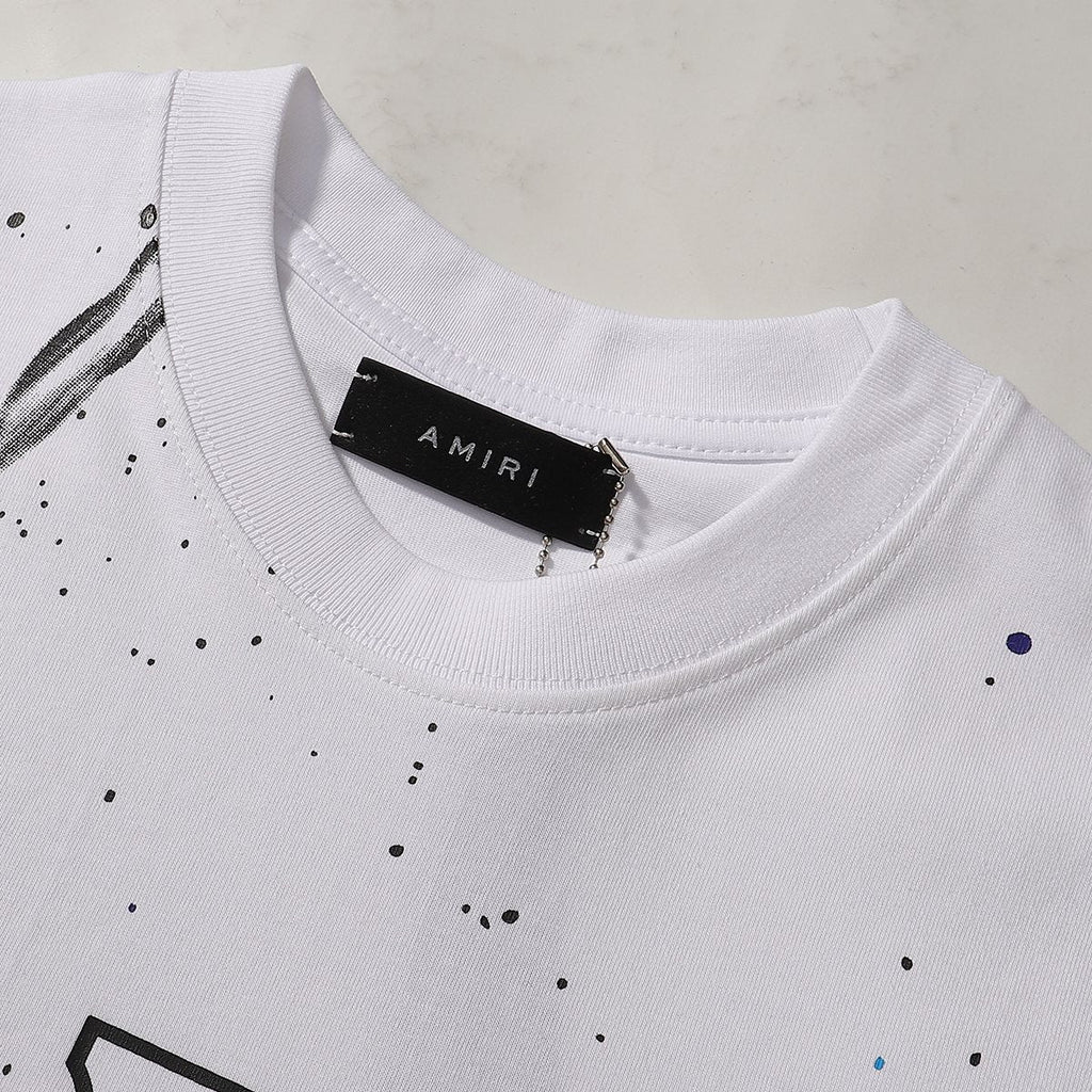 AMIRI Los Angeles Paint-Splatter Graphic T-Shirt — neck_label