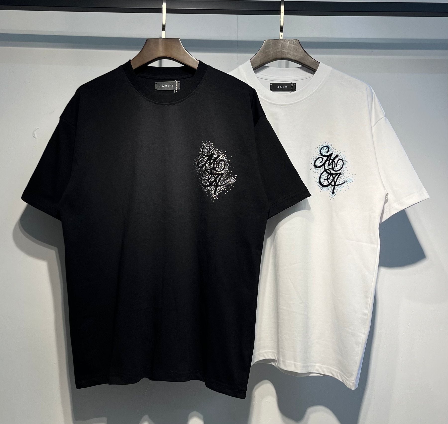 AMIRI Flocked Letter Graphic T-Shirt — comparison