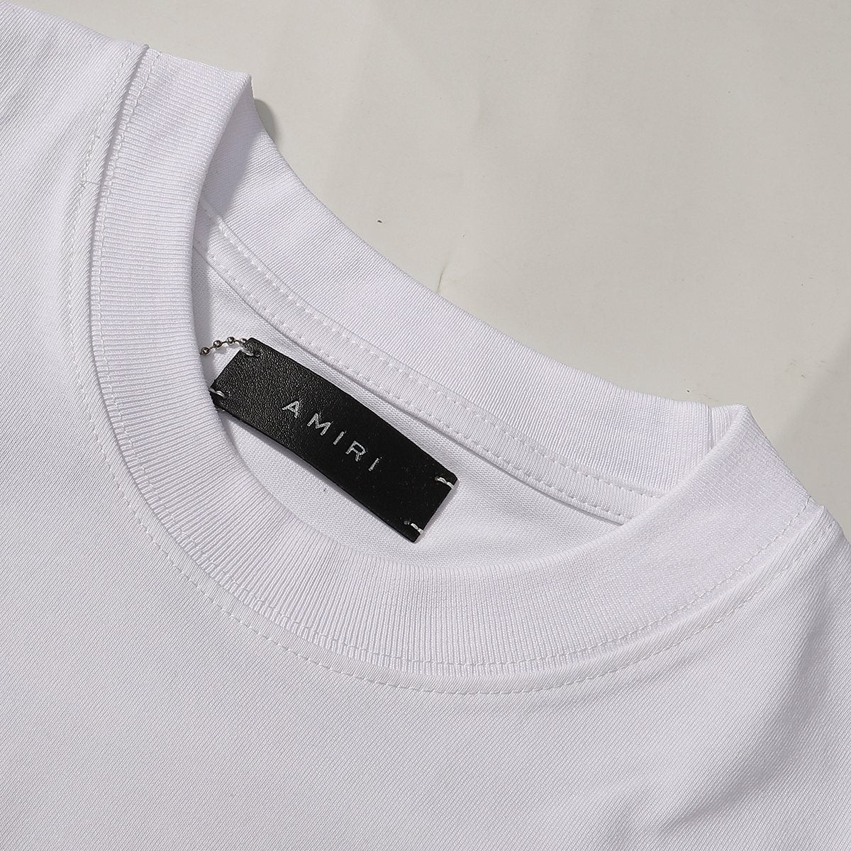 AMIRI Flocked Letter Graphic T-Shirt — neck_label