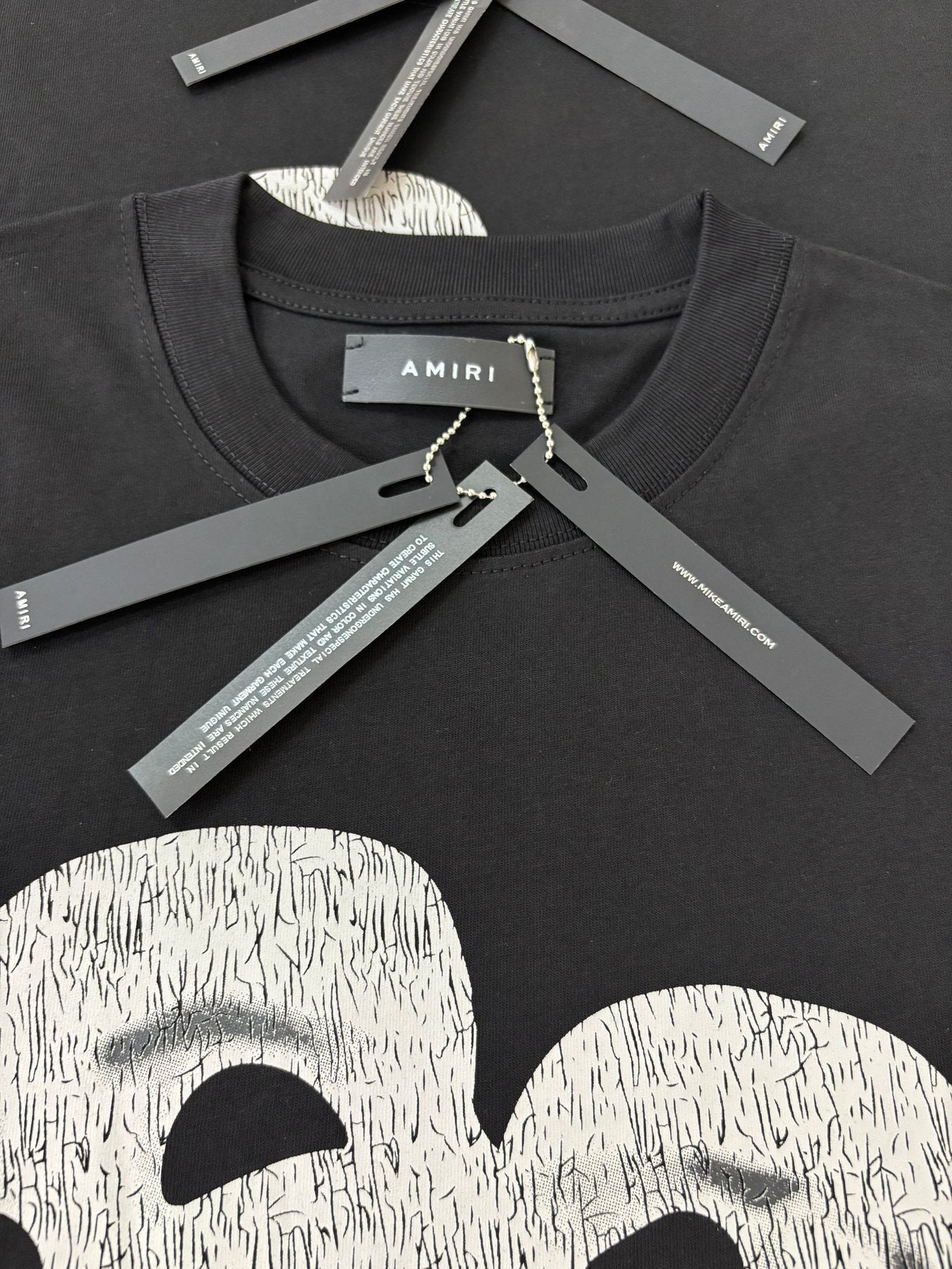AMIRI Theatrical Mask & Rose Graphic T-Shirt — hang_tag