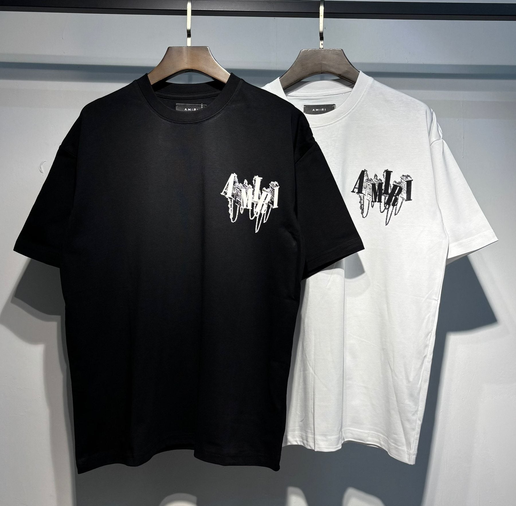 AMIRI Chain Letter Graphic T-Shirt — comparison