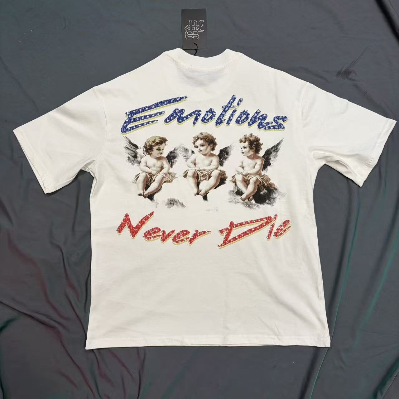 MIXED EMOTION Emotions Never Die Cherub Graphic T-Shirt — hero