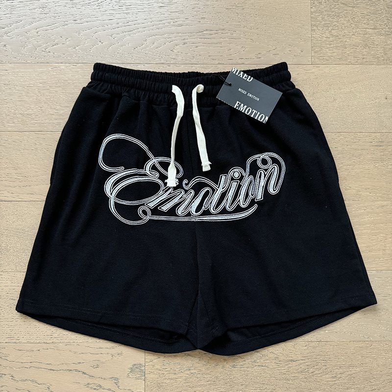 MIXED EMOTION Embroidered Drawstring Shorts — front