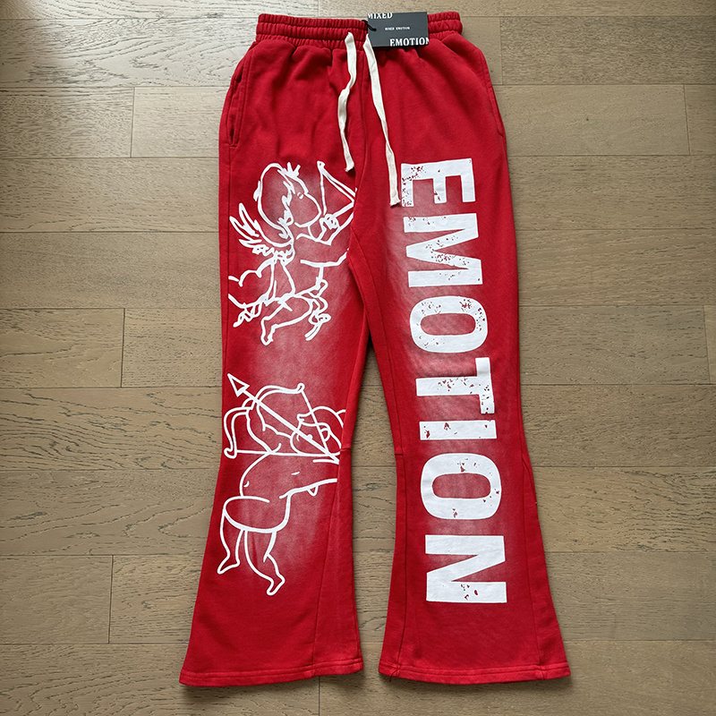 MIXED EMOTION Washed Graphic Flared Pants — front