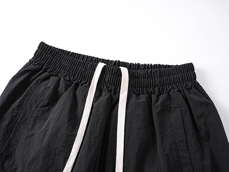 MIXED EMOTION Black Graphic Drawstring Pants — detail