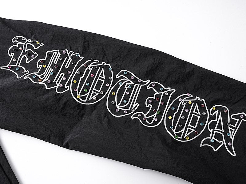 MIXED EMOTION Black Graphic Drawstring Pants — detail