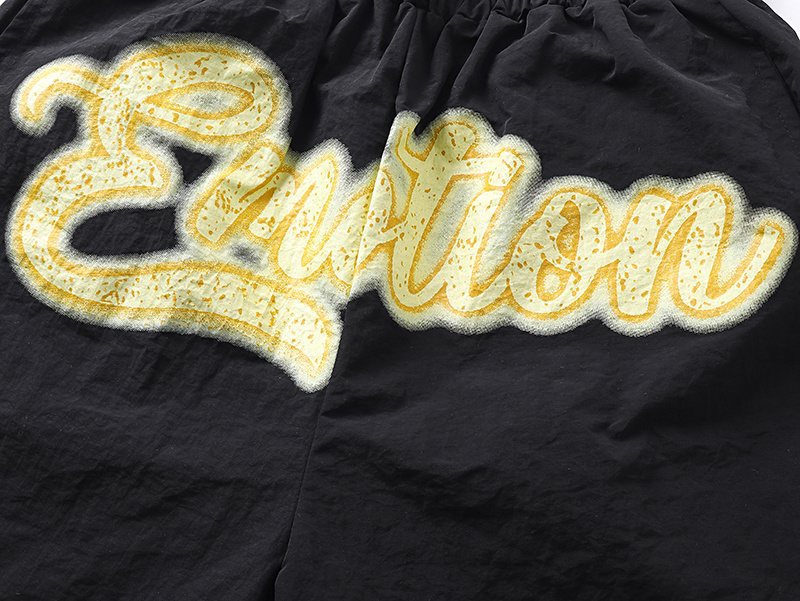 MIXED EMOTION Black Front Graphic Appliqué Shorts — detail