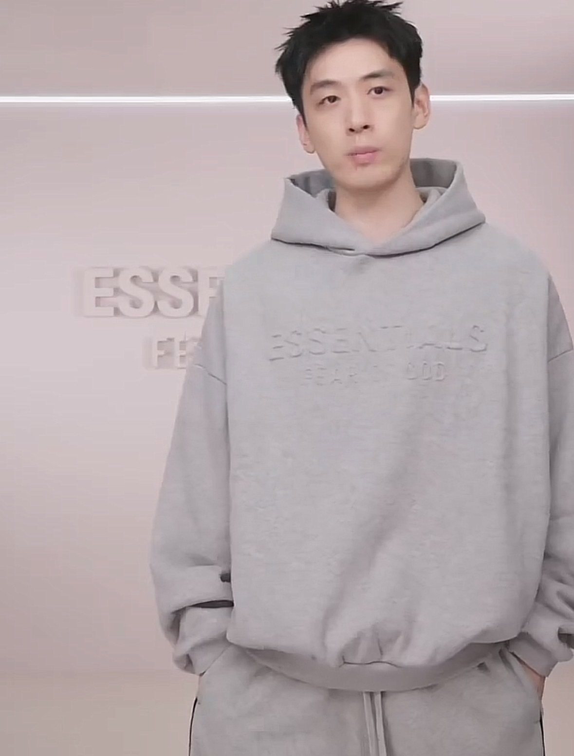 Fear of God Essentials Tonal Logo Pullover Hoodie — context