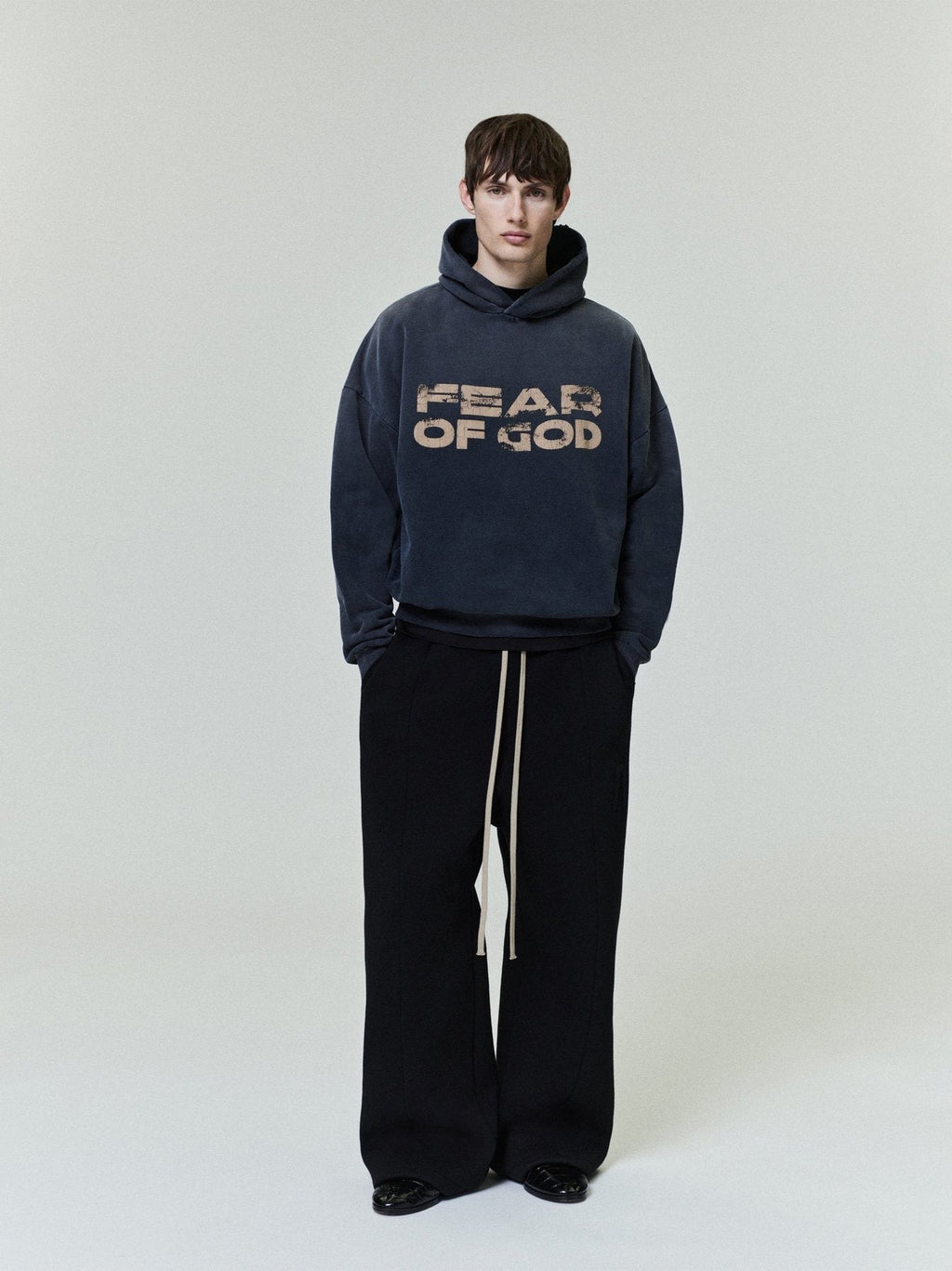 Fear of God Washed Black Side-Pocket Hoodie — context