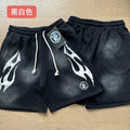 Hellstar Washed Flame Graphic Shorts — comparison