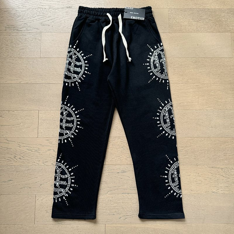 MIXED EMOTION Rhinestone Circle Graphic Sweatpants — front