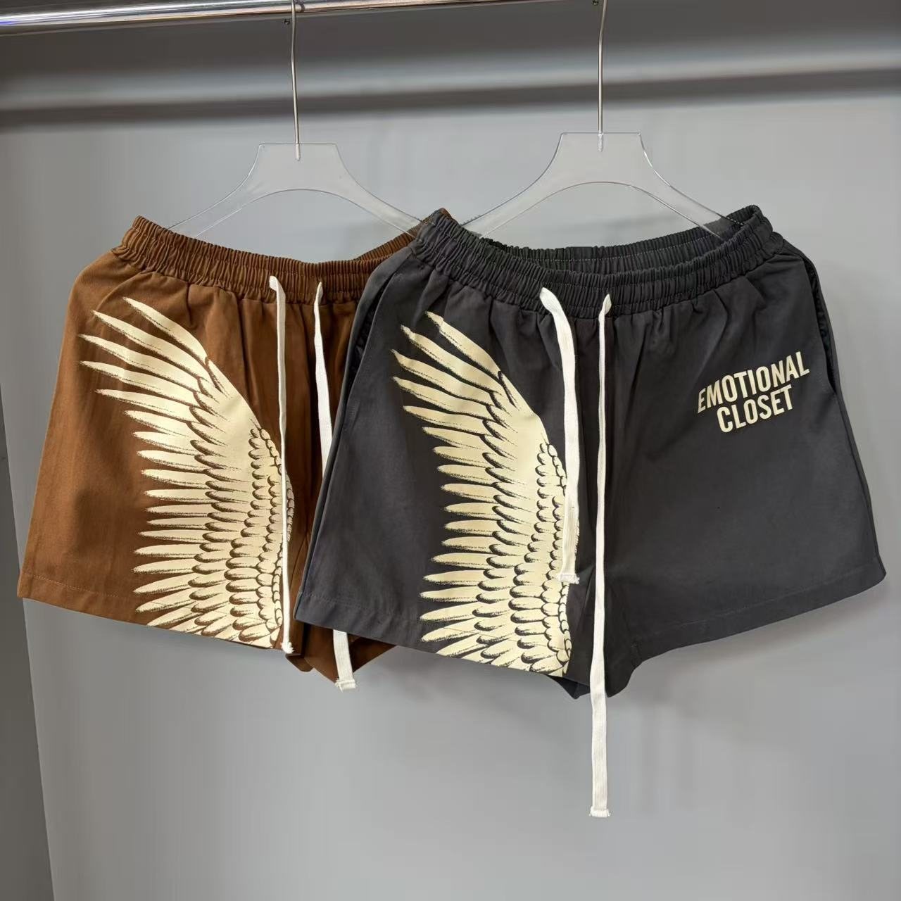 Emotional Closet Wing Graphic Drawstring Shorts — comparison