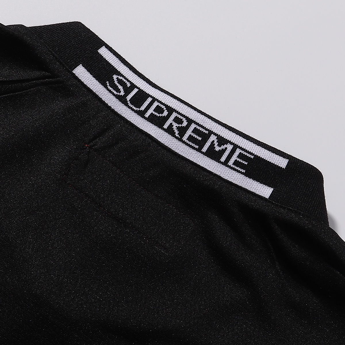 Supreme Black Soccer-Inspired Jersey Graphic T-Shirt — neck_label