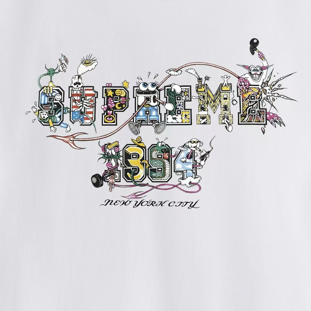 Supreme Cartoon Letter Graphic T-Shirt — fabric_closeup