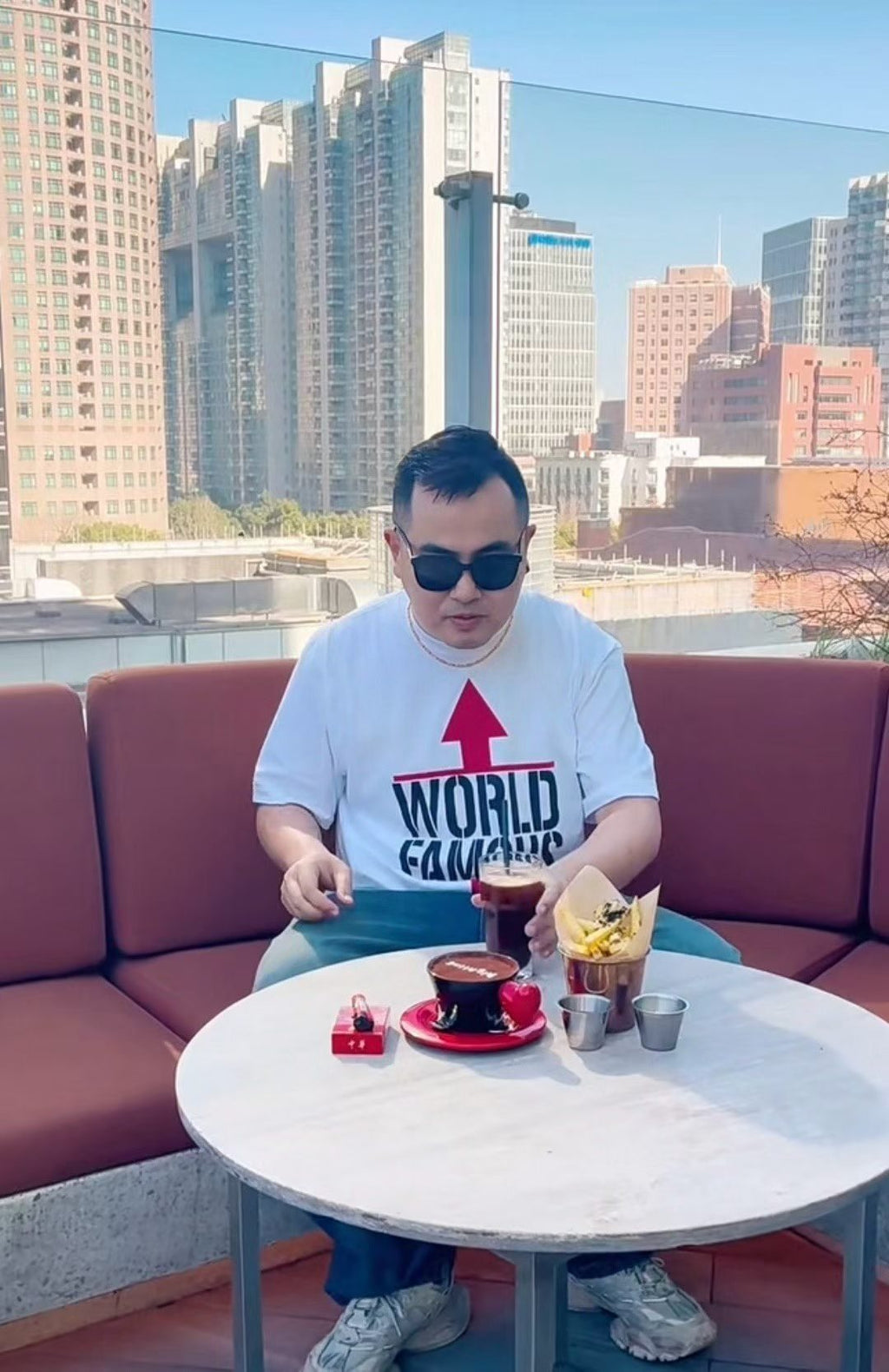 Supreme World Famous Short-Sleeve Graphic T-Shirt — context