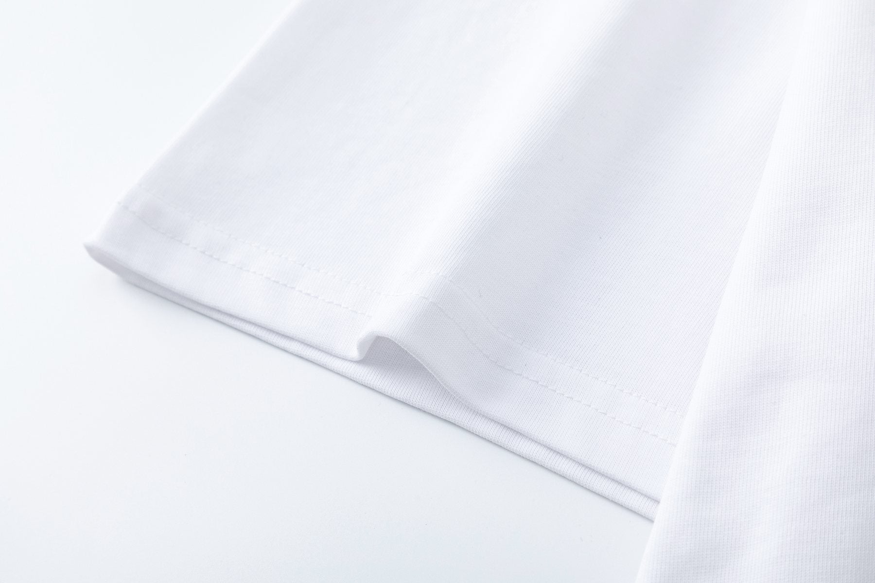 Supreme World Famous Short-Sleeve Graphic T-Shirt — fabric_closeup