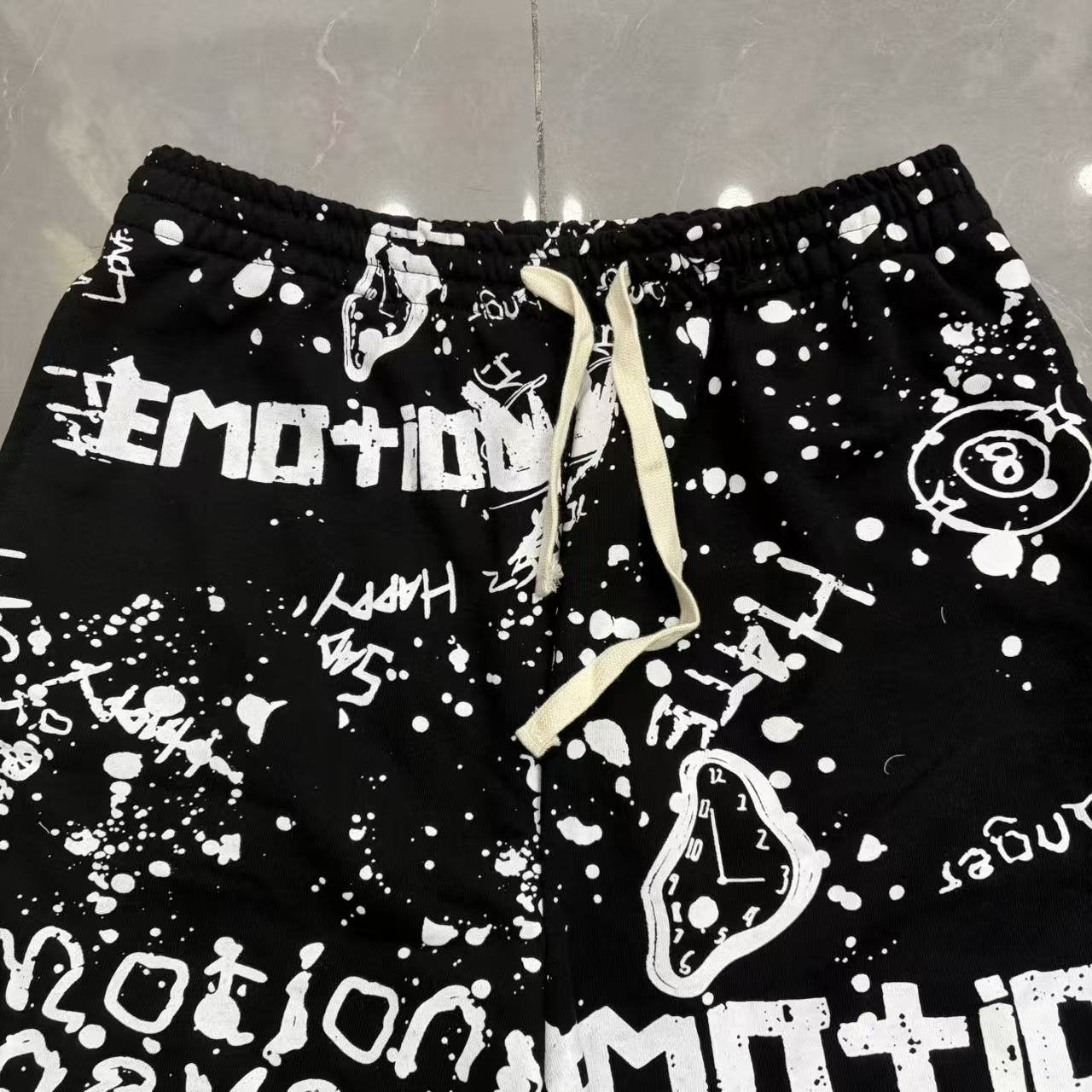 MIXED EMOTION Graffiti Paint Splatter Drawstring Shorts — fabric_closeup