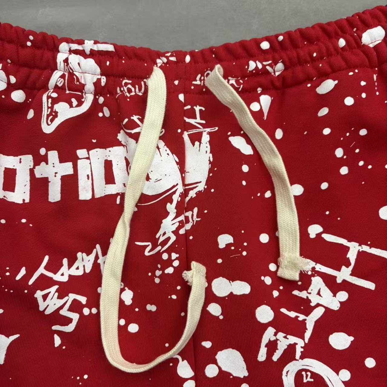 MIXED EMOTION Graffiti Paint Splatter Drawstring Shorts — fabric_closeup