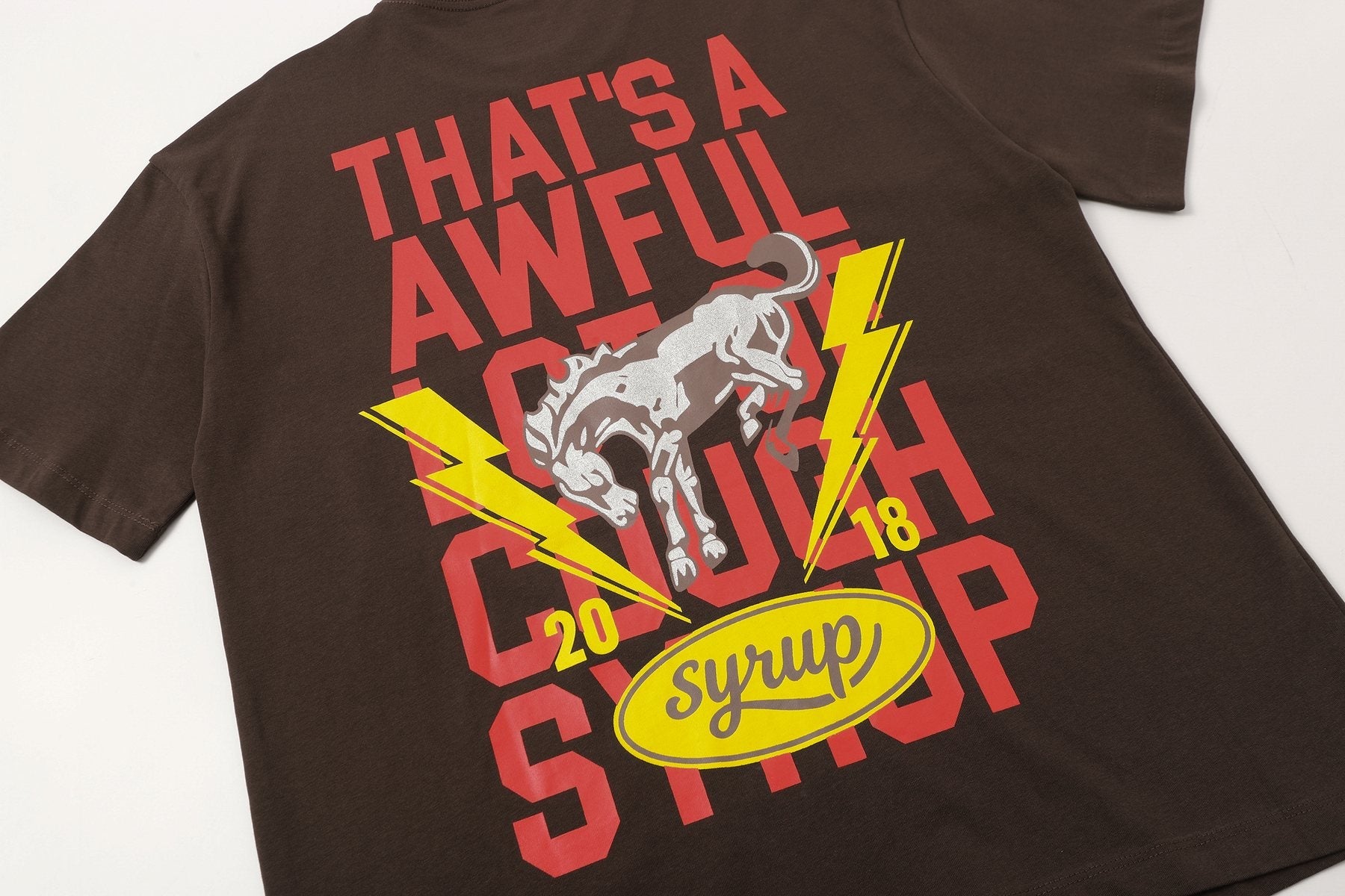 THAT'S A AWFUL LOT OF COUGH SYRUP Bull Lightning Graphic T-Shirt — detail