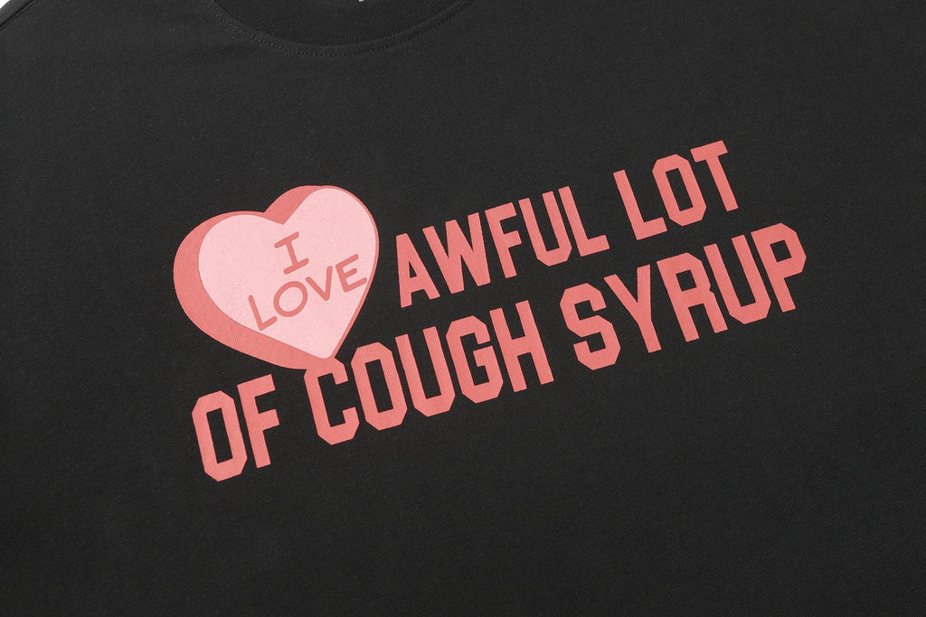 THAT'S A AWFUL LOT OF COUGH SYRUP Cupid Heart Graphic T-Shirt — detail