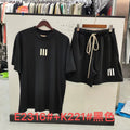 ESSENTIALS Three-Bar Graphic T-Shirt and Shorts Set — hero