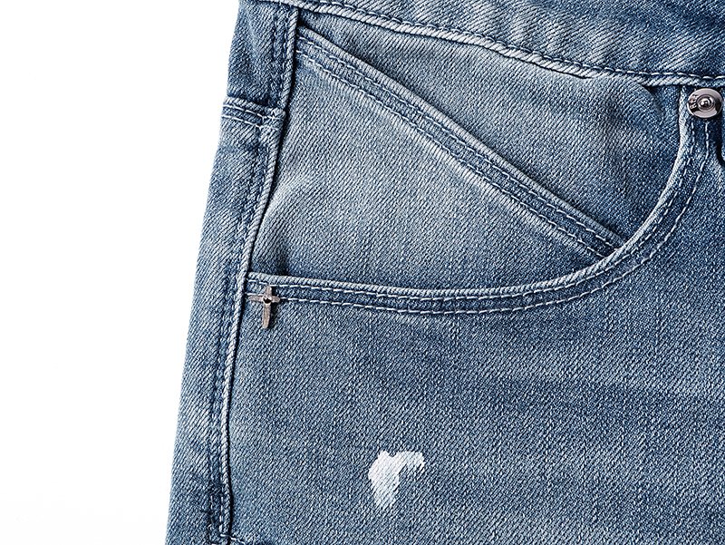 R+A Light Blue Paint-Splatter Patchwork Jeans — detail
