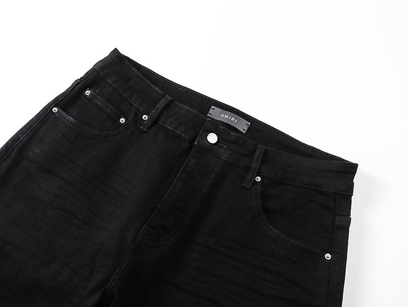 AMIRI Tonal Monogram Denim Shorts — detail