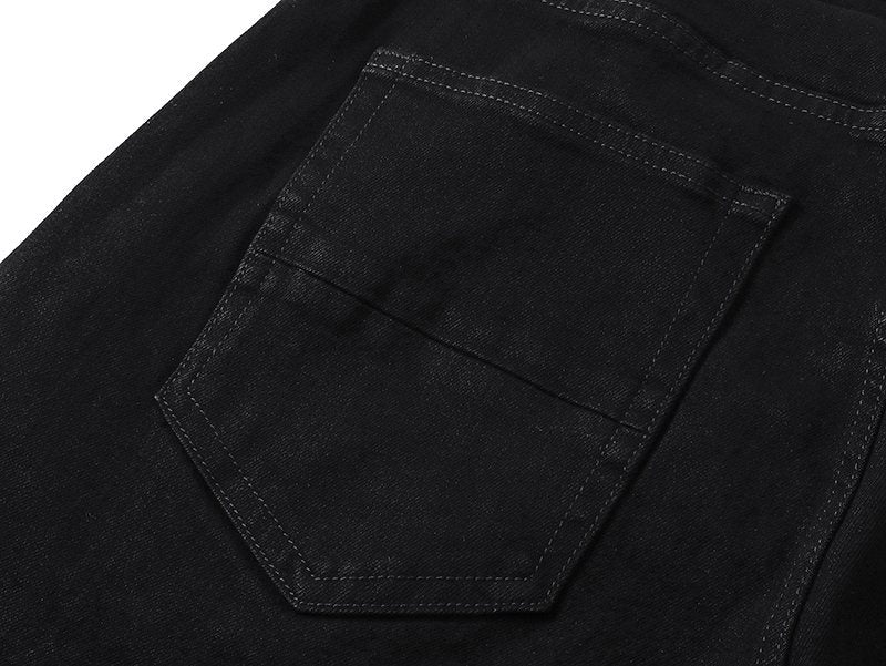 AMIRI Tonal Monogram Denim Shorts — detail