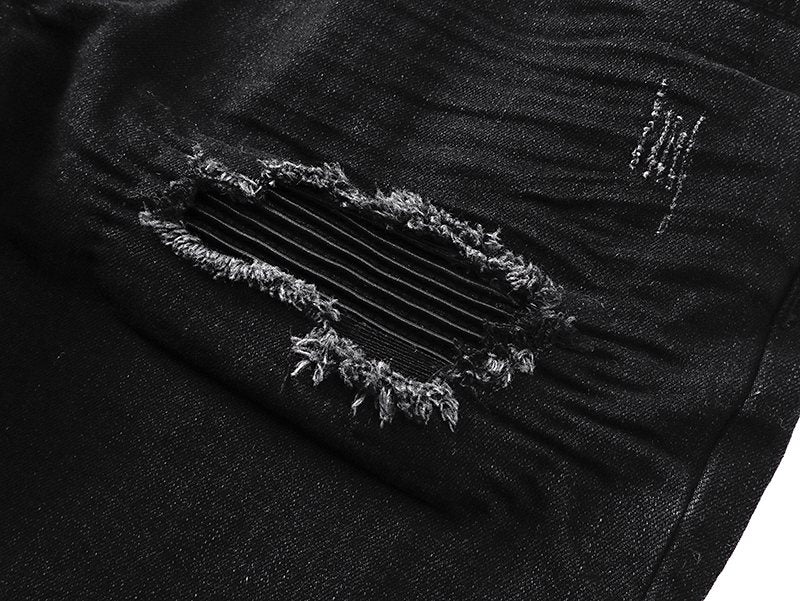 AMIRI Black Distressed Ribbed Knee Jeans — detail