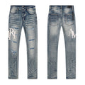 AMIRI Light Blue Distressed Letter Graphic Jeans — hero
