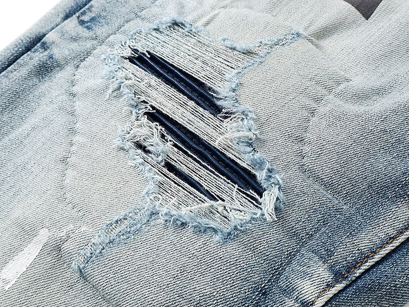 Amiri Light Blue Distressed Leg Print Jeans — detail